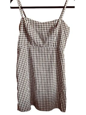 Women's brown and white gingham Junior size mini dress with spaghetti straps.